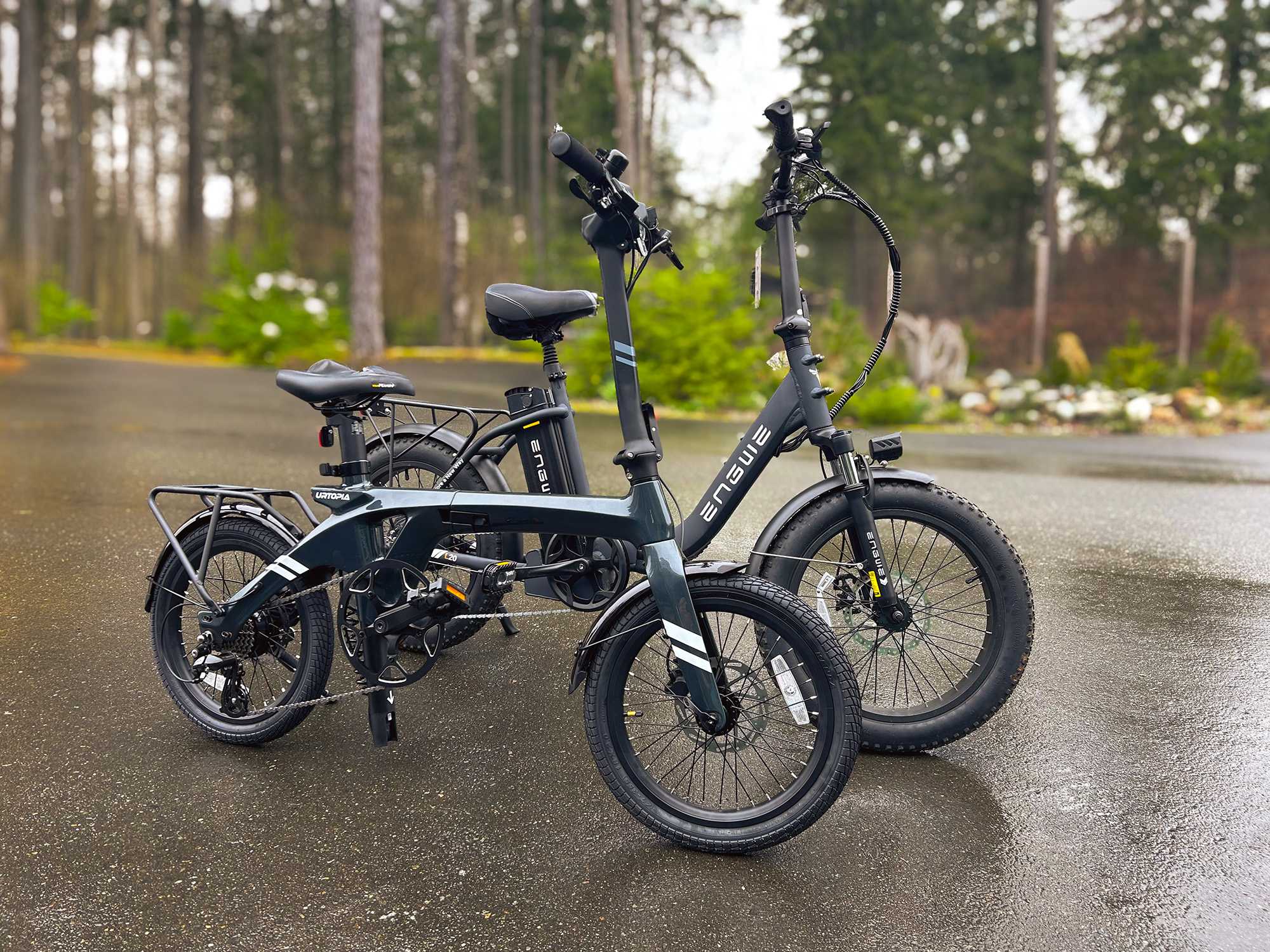 16-inch and 20-inch folding bikes side-by-side on a wet road