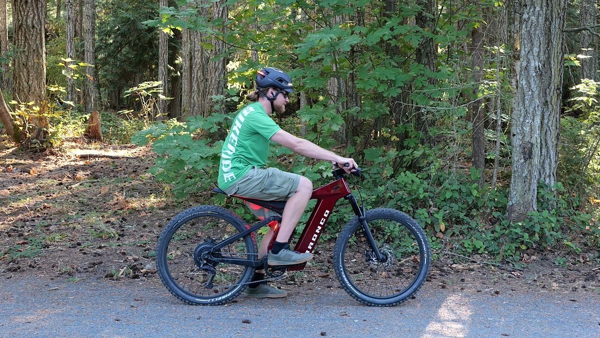 Our tester riding a test e-bike on the standard range loop at maximum assist