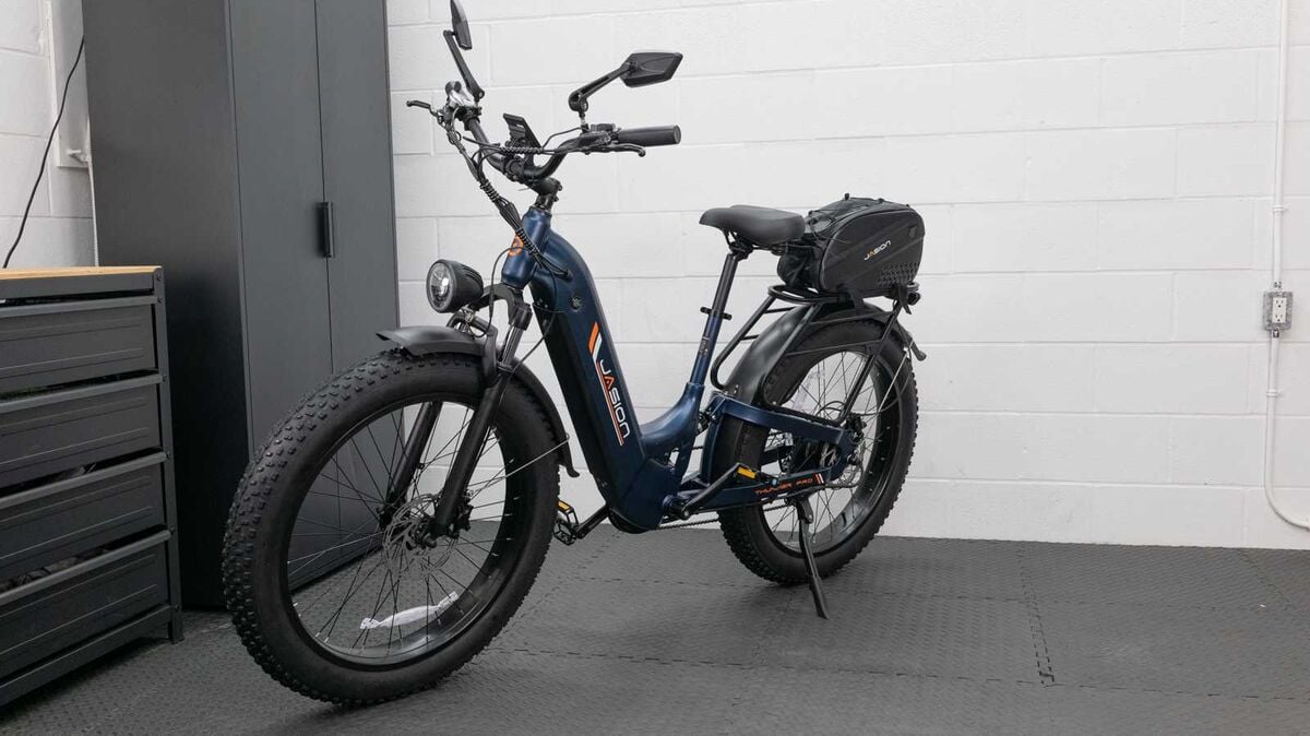 A test bike fitted with a rear rack and bag in the BikeRide studio