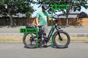 Graphic showing our 6-foot tester with a 33-inch inseam at full seatpost extension on the Thunder Pro