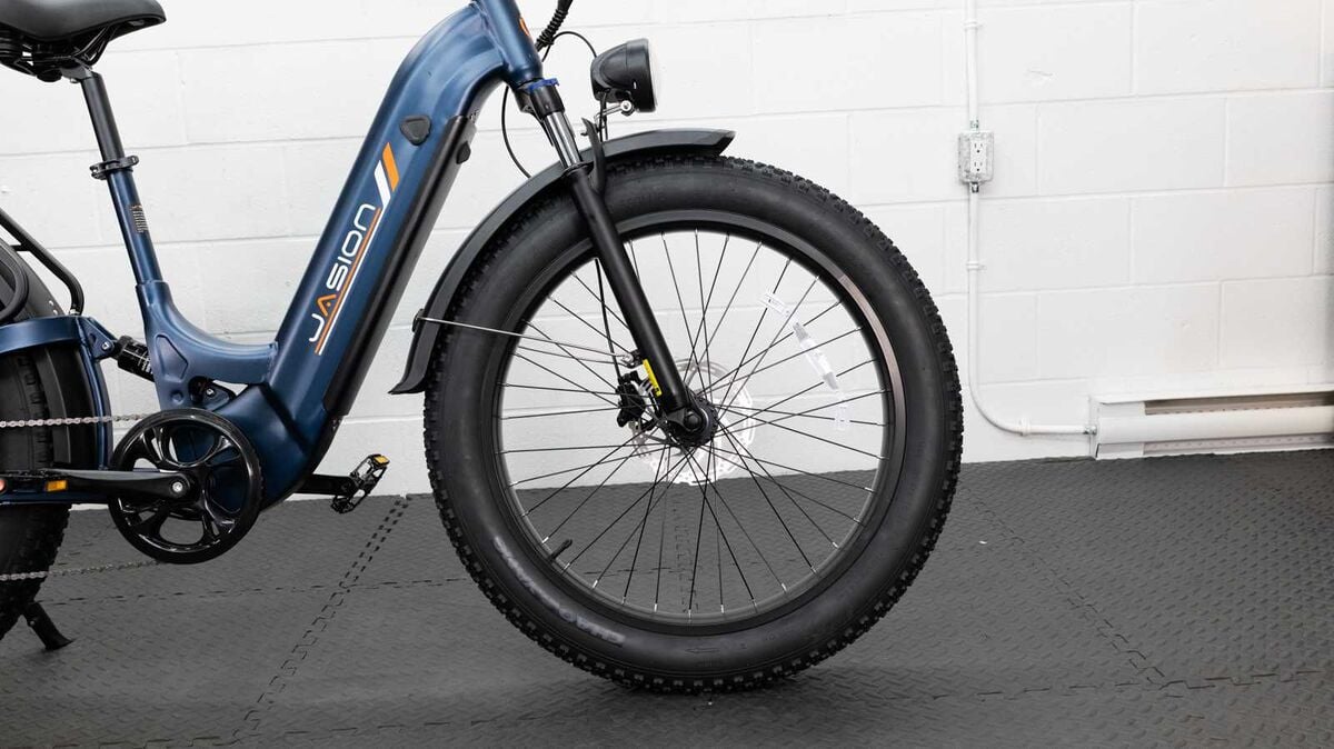 The front suspension fork of a test bike up close