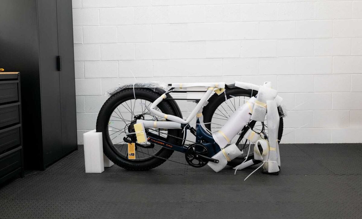 A bike arriving partially assembled in its shipping box